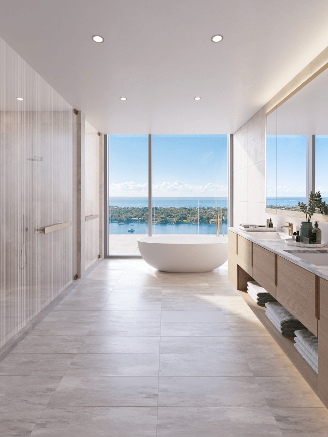 interior shot of a luxury bathroom with a tub and views of the palm beach port