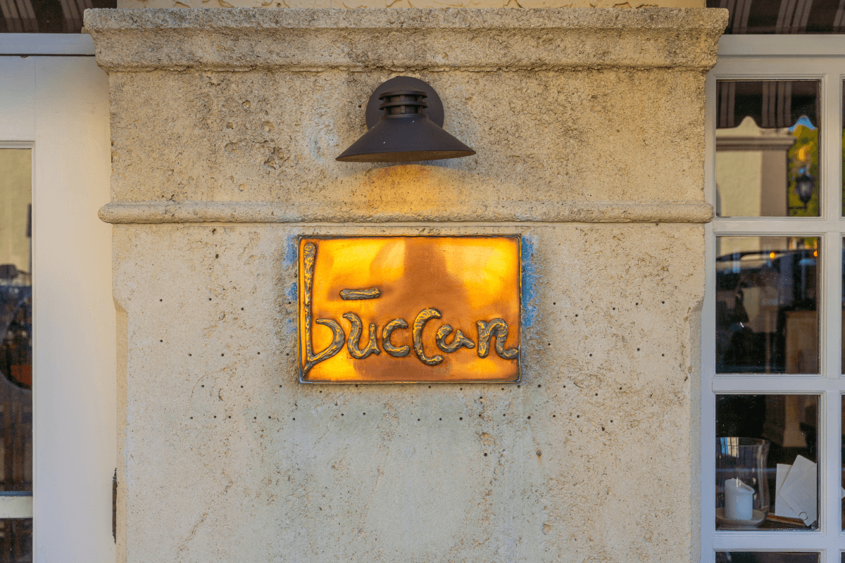 close up shot of a restaurant sign in Palm Beach called Buccan