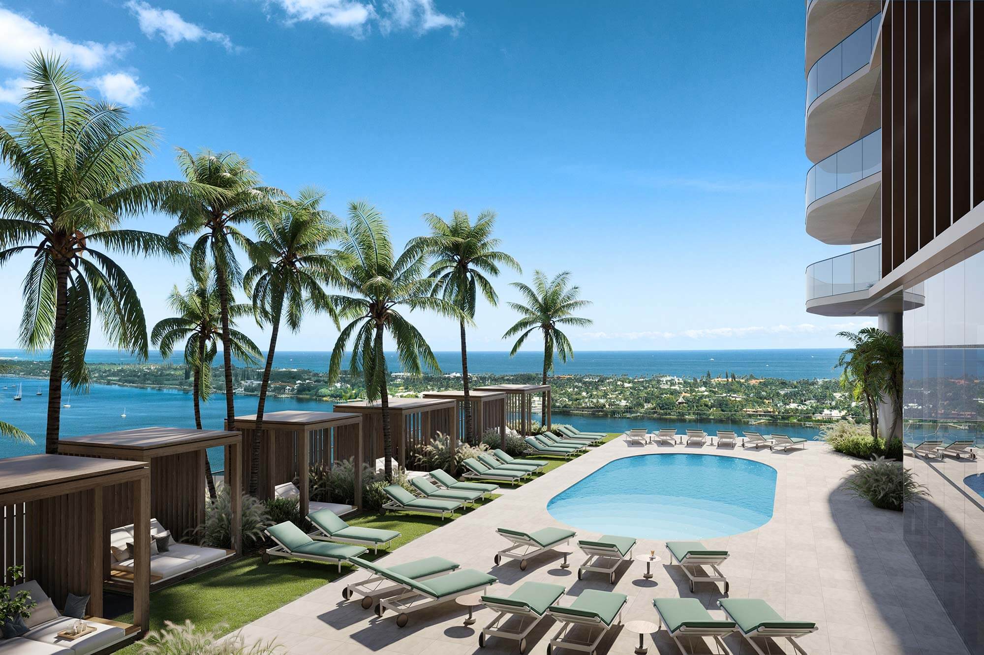olara's private pool area with luxury chaise chairs and a view of intracostal